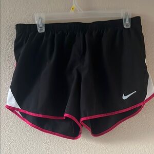 Nike Black and Pink Athletic Shorts with Curved Hem